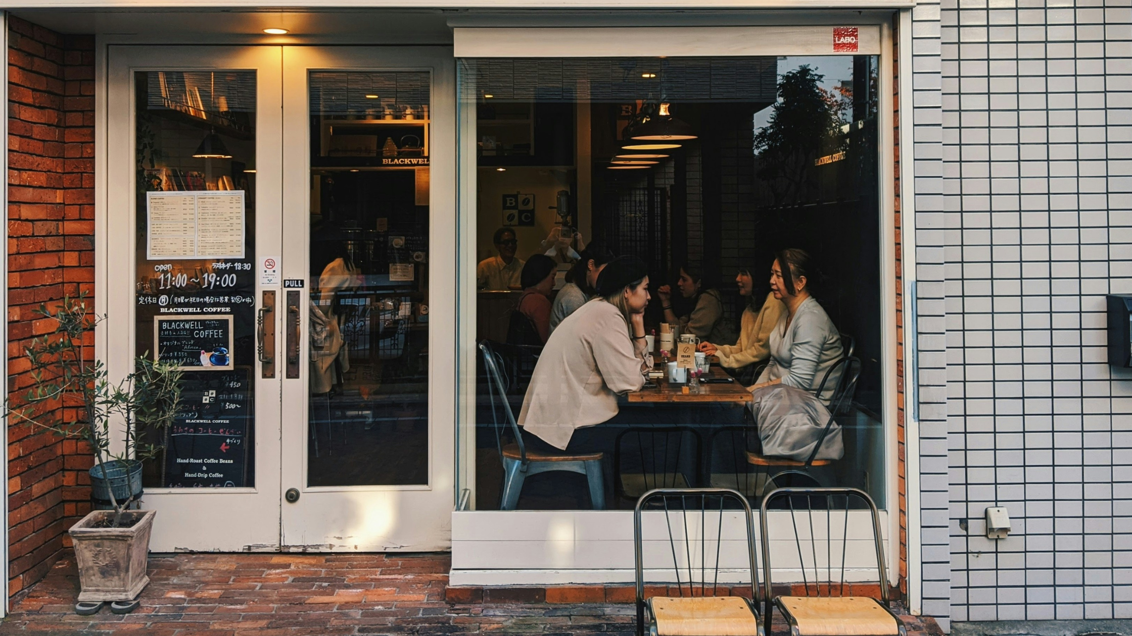 women meet on a winter day at a cafe in japan