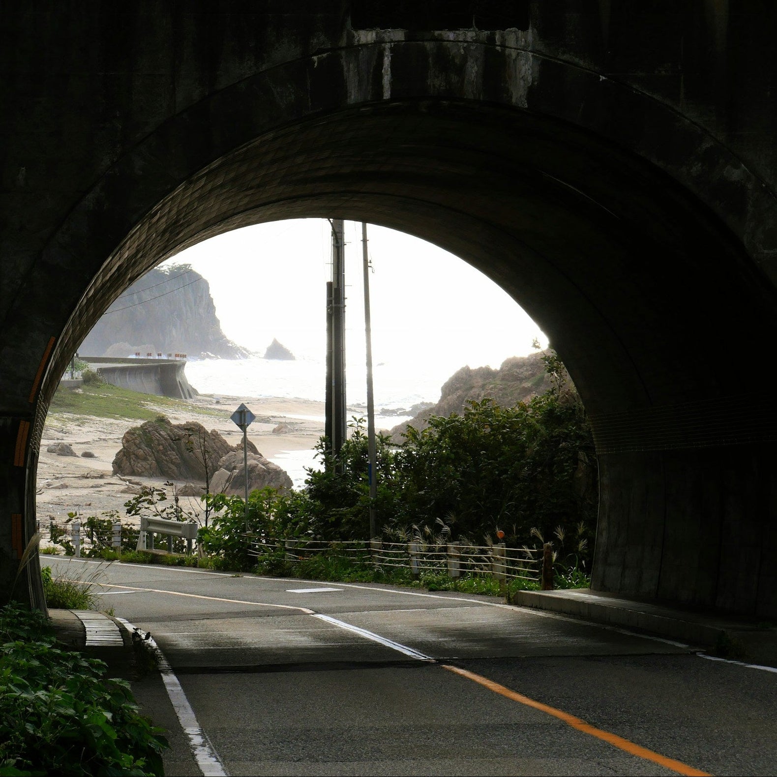 Thanks Andy Arbeit on Unsplash - Tunnel and coast beyond in Japan