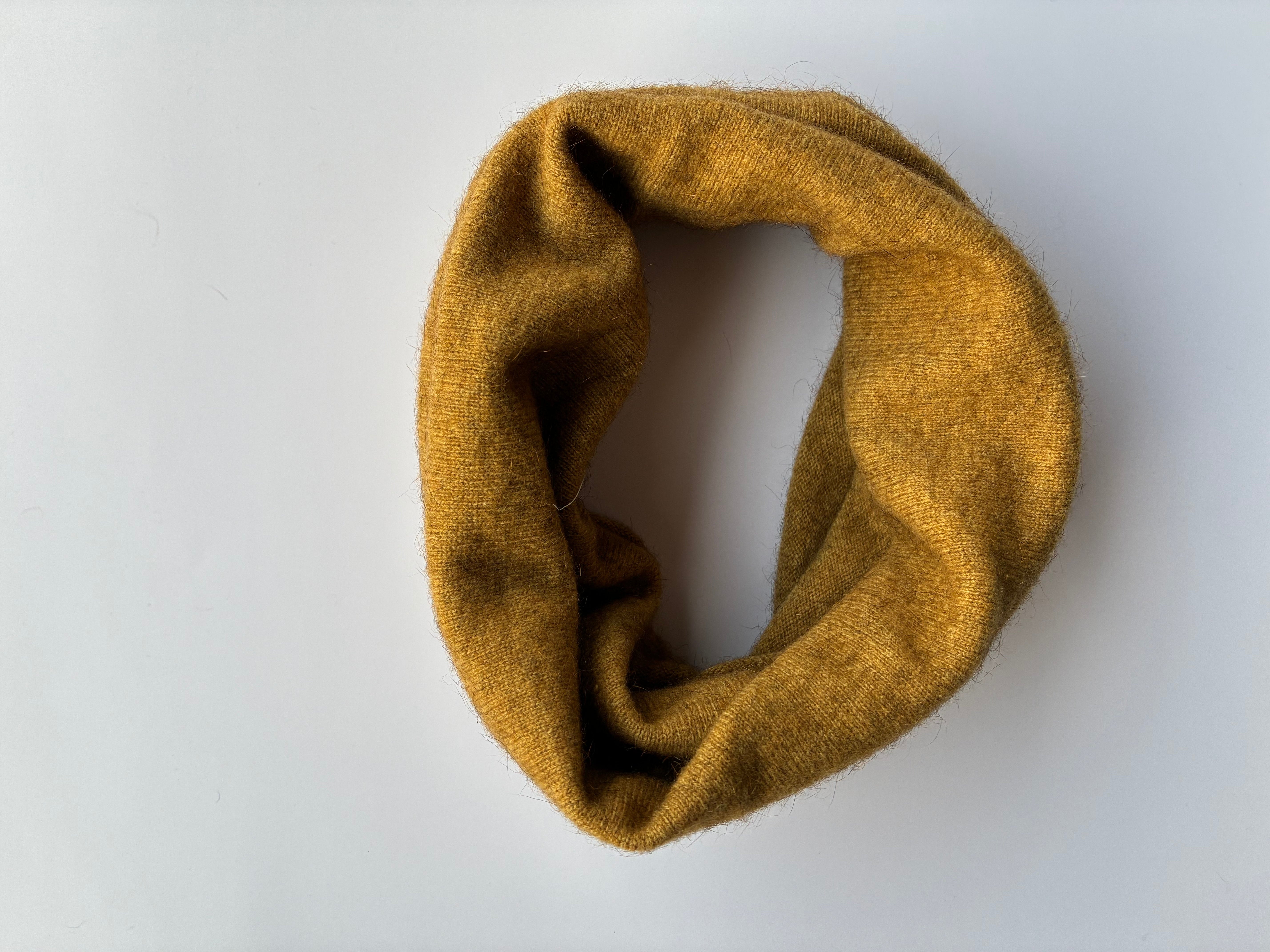 Mustard Marigold yellow snood neckwarmer on a white background